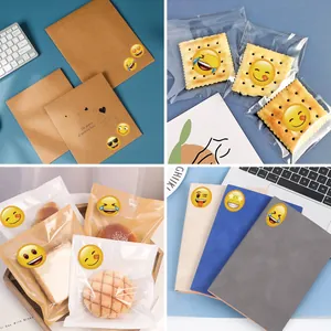 Funny emoji reward stickers shown on various gift packaging and stationery items