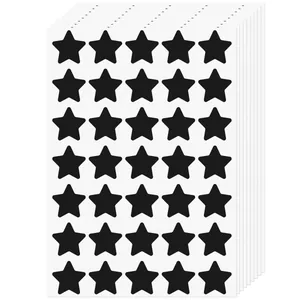 Bulk pack of black star-shaped self-adhesive reward stickers for primary student praise