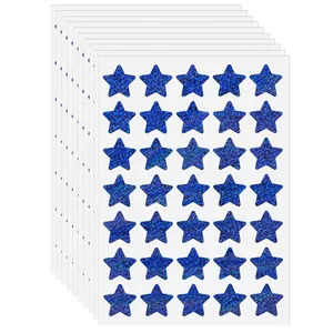 Stack of blue glitter holographic star stickers for children rewards and crafts