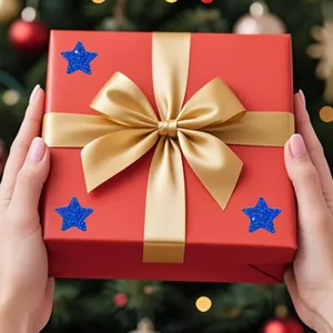 Decorative blue glitter star stickers for festive gift wrapping and student rewards