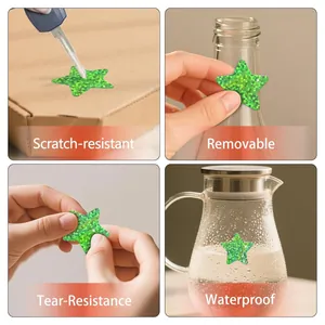 Detail views showing scratch-resistant and waterproof green glitter star reward stickers
