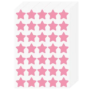 Macro view of multiple sheets of pink star reward stickers for kids motivation
