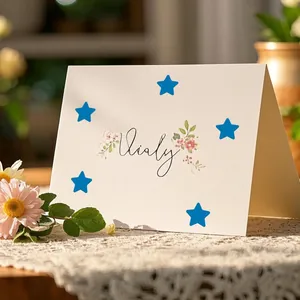 Blue star reward stickers applied on a decorative card for children's encouragement
