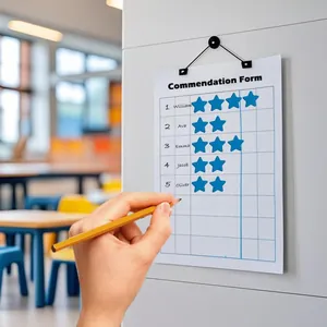 Blue star stickers applied to a student commendation form for classroom reward systems
