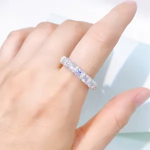 Detailed macro shot of a sparkling 925 silver eternity ring with 4mm moissanite diamonds