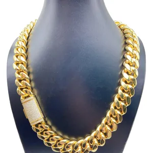 Detailed view of heavy 18mm gold Cuban link necklace featuring iced out moissanite clasp
