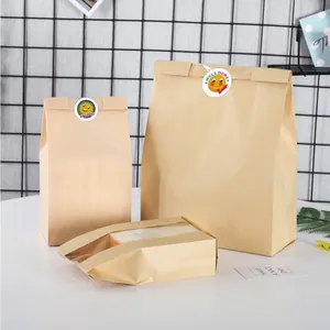 Detail shot of cute smiley face reward stickers used as seals on brown paper bags
