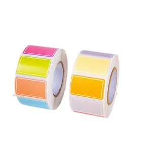 Two rolls of vibrant colorful PVC self-adhesive labels for handwriting and indexing
