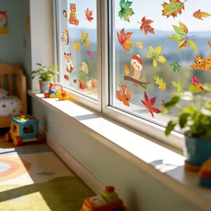 Lifestyle detail of colorful autumn leaf and forest animal stickers on a window glass