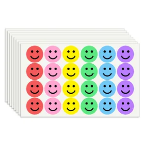 Close-up of colorful smiley face reward stickers for kids with 24 pieces per sheet