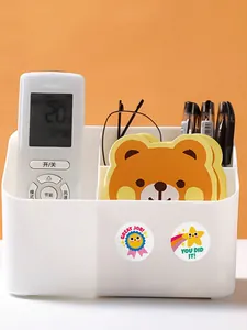 Vue détaillée des autocollants de récompense 'Great Job' et 'You Did It' sur un bureau