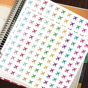 Adesivi colorati con aeroplani per la pianificazione dei viaggi e decorazione diari.