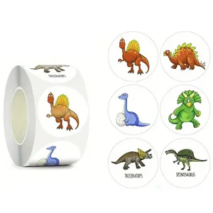 Detailed view of colorful cartoon dinosaur reward stickers for children, 500 pieces per roll.