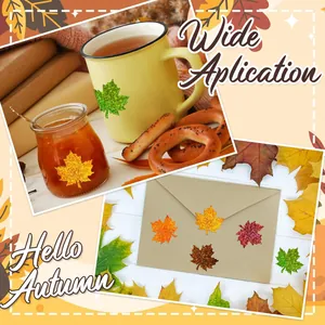 Detail view of colorful glitter maple leaf stickers on an envelope and mug.
