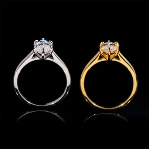 Detaillierte Nahaufnahme von Marquise-Moissanit-Ringen in Silber und vergoldeter Optik