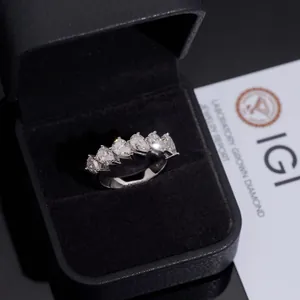 Detailed close-up of S925 silver ring featuring pear-cut moissanite stones