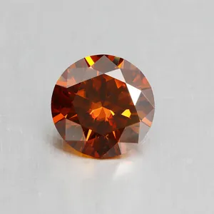 Primer plano de una piedra preciosa de moissanita rojo granada de talla brillante y fuego