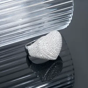 Detailed macro view of hip hop style sterling silver heart ring paved with sparkling Moissanite