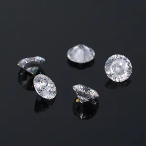 Close-up of five round special-cut Moissanite stones with sparkling fire on black