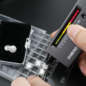 Testing D color VVS moissanite loose stone with a professional diamond selector pen
