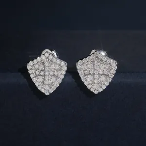 Macro view of S925 silver shield-shaped stud earrings with full Moissanite pavé