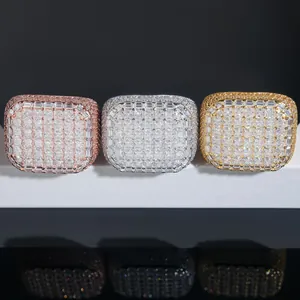 Macro detail of iced out square moissanite rings in rose, silver and gold finishes