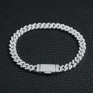 Close-up of 6mm Moissanite encrusted S925 silver Cuban link bracelet on black leather