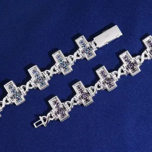 Detailed macro view of S925 silver cross bracelet with colorful iced out moissanite stones