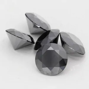 Gros plan de pierres de moissanite noire en taille brillant