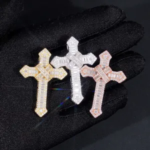 Detail shot of hip-hop cross pendants in gold, silver, and rose gold with moissanite