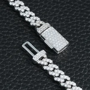 Detailed macro view of S925 silver iced out Moissanite Cuban chain clasp mechanism