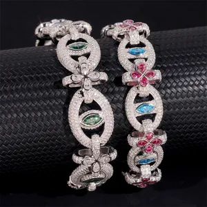 Close-up of S925 silver hip-hop bracelets with inlaid moissanite and colorful gems.
