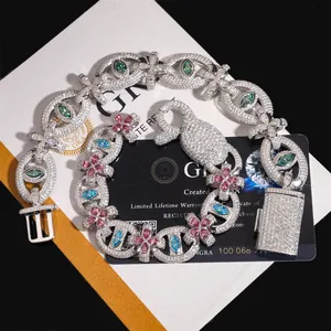Luxury hip-hop S925 silver bracelet featuring colored moissanite in cross and eye design