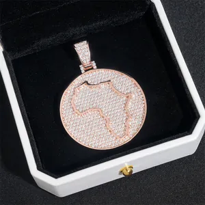 Detailed close-up of a rose gold Africa map pendant fully set with moissanite stones