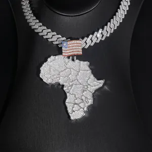 Detailed view of iced-out Africa map pendant with American flag on Cuban link chain