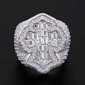Close-up detail of a 925 silver ring featuring a baguette moissanite cross design.