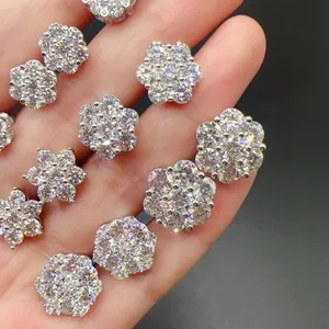 Close-up view of S925 sterling silver flower stud earrings set with sparkling moissanite