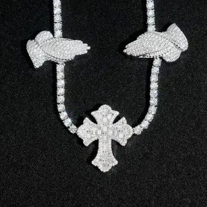 Exquisite detail of Moissanite studded cross and praying hands on a 3mm tennis chain necklace