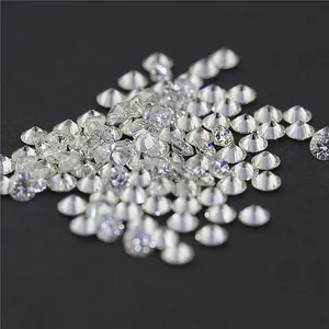 Close-up macro view of round D color Moissanite loose stones featuring 3EX cut brilliance