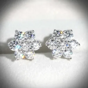 Elegant S925 sterling silver flower stud earrings featuring brilliant moissanite stones