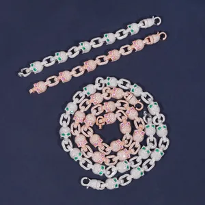 Detailed view of S925 silver moissanite skull hip-hop bracelets and chains set with green eyes.