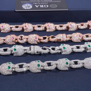 Macro view of hip-hop Cuban link bracelets with iced-out skulls and GRA certificate