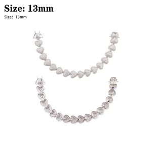 Detail view of 13mm heart-shaped Cuban link chain with Moissanite stones