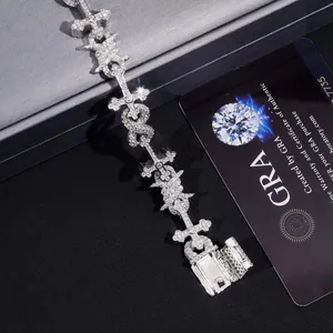 Macro view of 12mm hip-hop moissanite cross bracelet featuring icy full-diamond setting