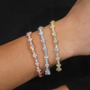 Detailed view of sparkling moissanite tennis bracelets in gold and silver finishes.