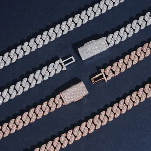Macro detail of 10mm triple-row moissanite Cuban link chains in silver and rose gold.