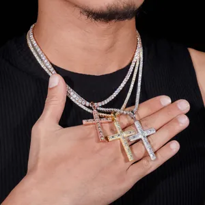 Close-up of hip hop moissanite cross pendants in rose gold, yellow gold, and silver
