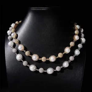 Detail view of hip-hop pearl necklace with full moissanite pavé on black mannequin