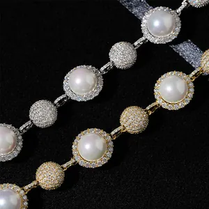 Macro detail showing 10mm pearls and moissanite stones on hip hop silver necklace