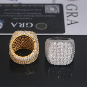 Macro view of square full pave moissanite hip-hop rings in gold and silver finish